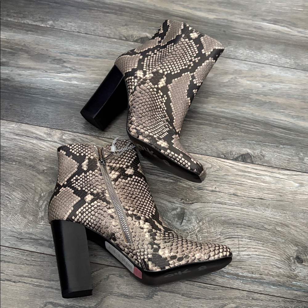Steve Madden Black and Tan Snakeskin Heeled Boots
